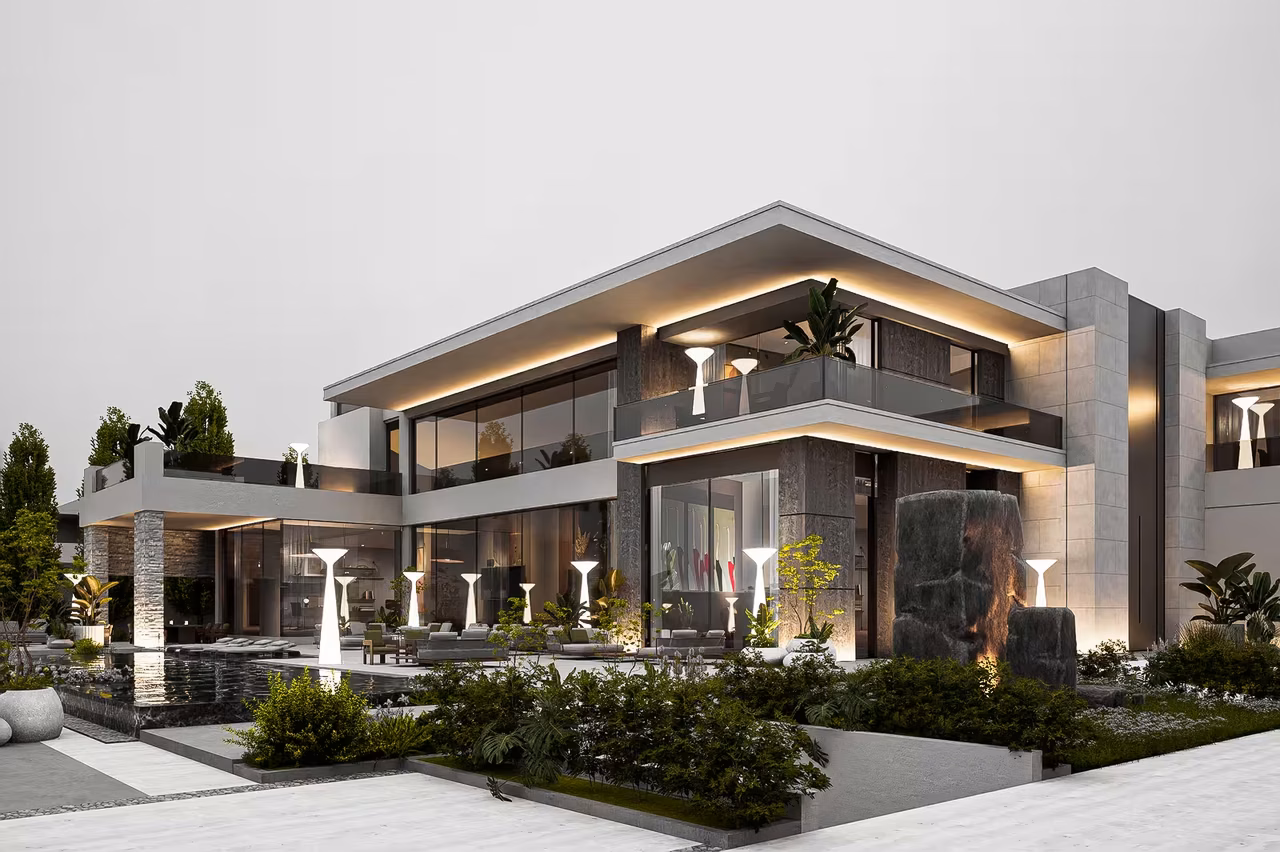 Contemporary villa with stone volumes, lit terraces, water edge and landscaped outdoor rooms