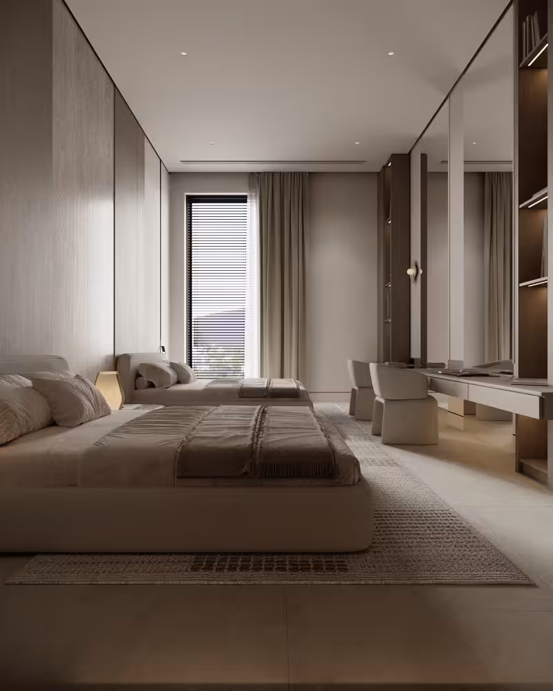 Primary bedroom with upholstered bed, integrated media joinery and a window-side sitting area