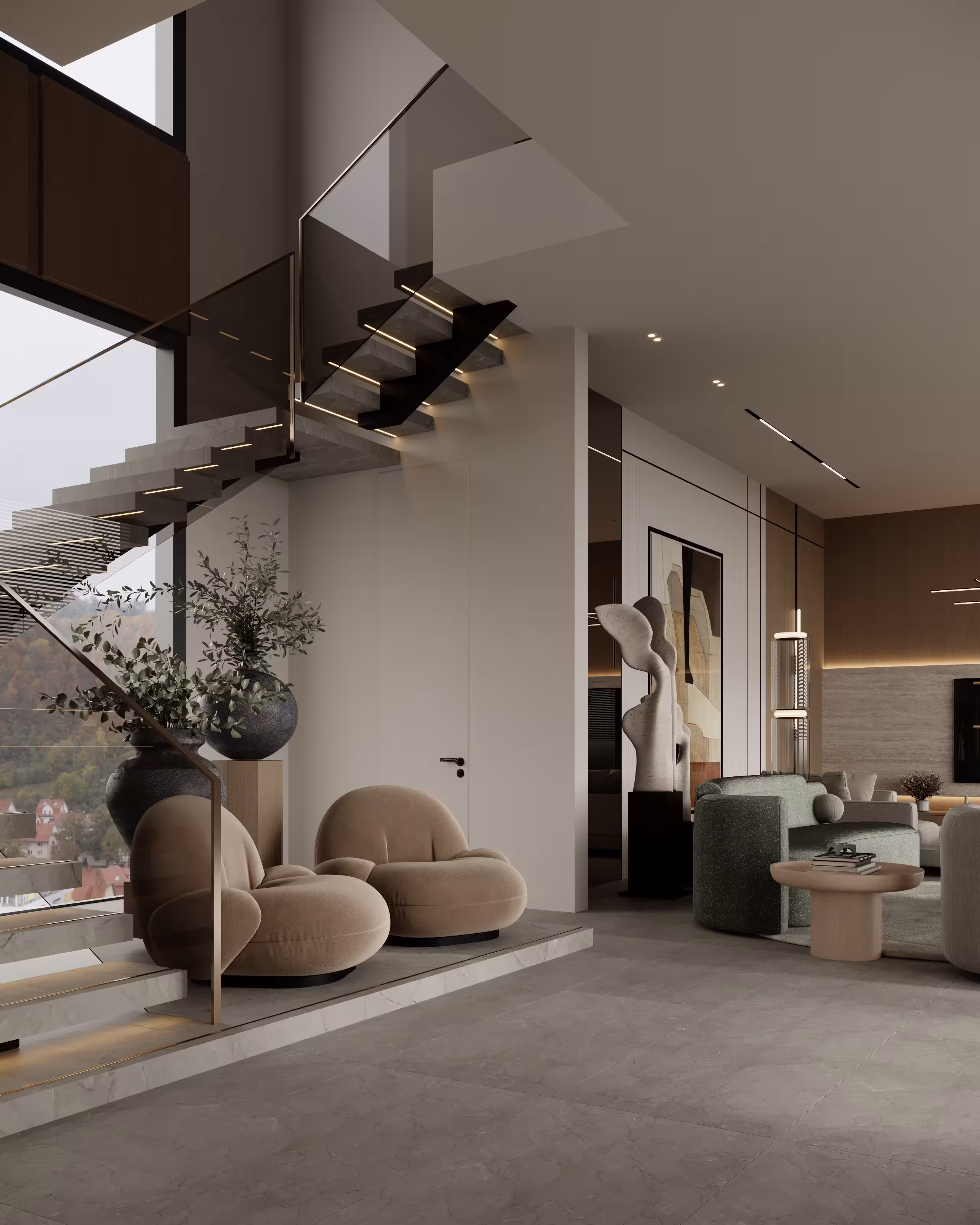 Double-height stair hall with floating steps, sculptural chairs and tall glazing